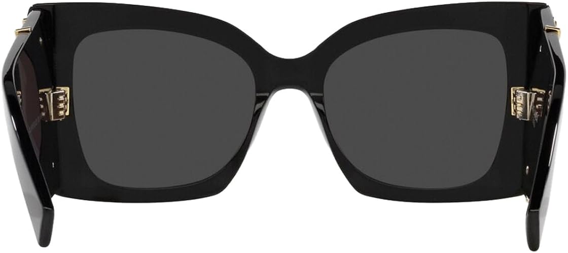 Black oversized sunglasses with dark gray lenses and gold-tone decorative hardware on the temples, shown against a plain white background.