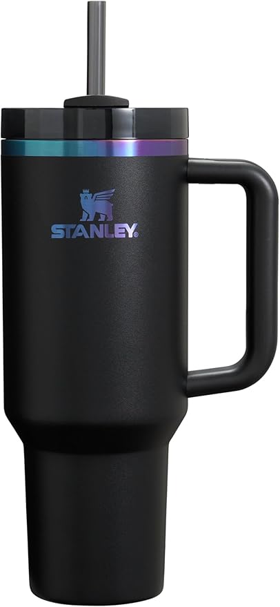 Black Stanley tumbler with handle on a white background