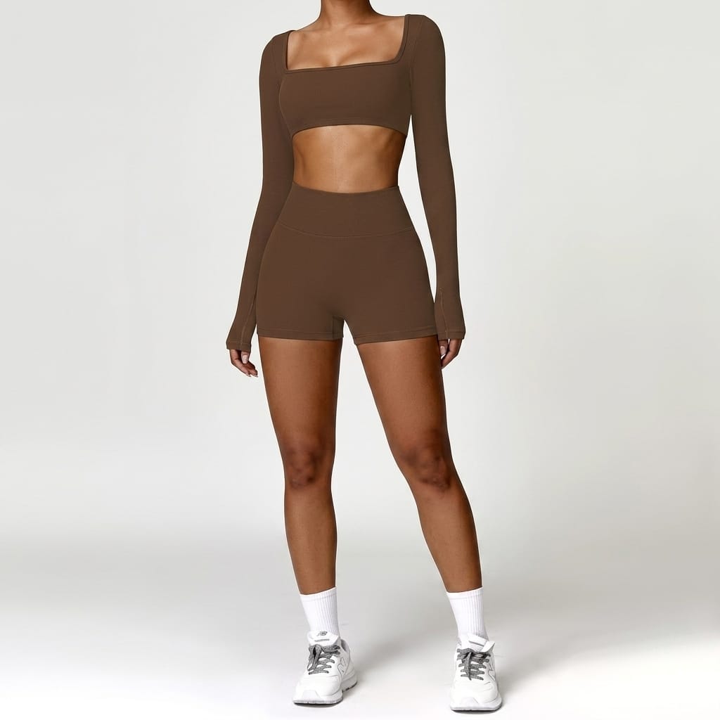 Brown long-sleeve outfit with cutout design on a white background