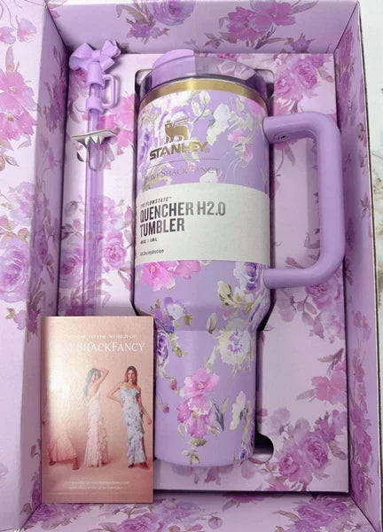 Floral-patterned tumbler in a decorative box with a card inside.
