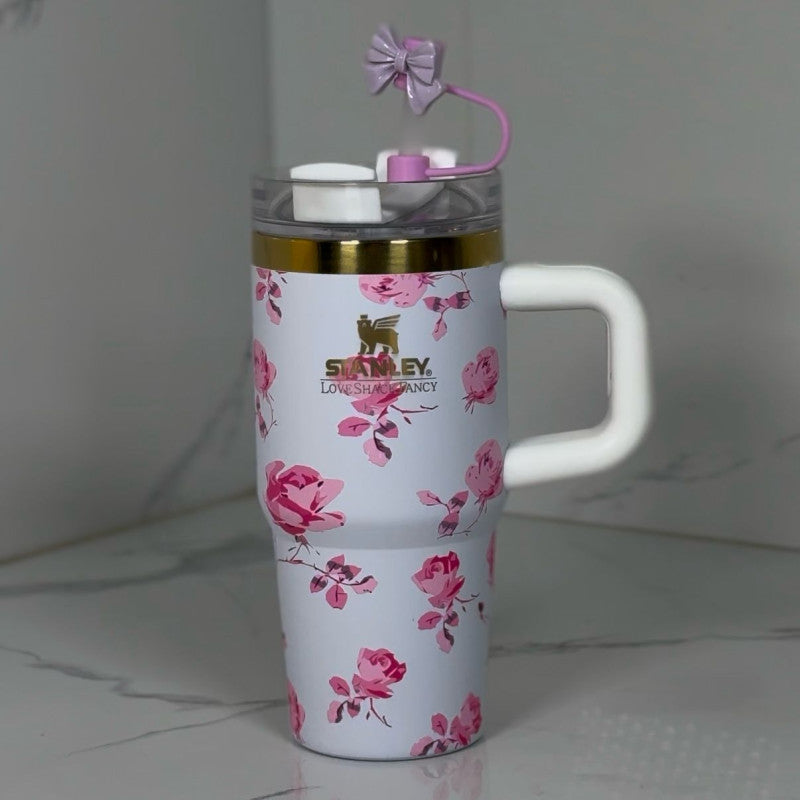 Floral-patterned tumbler with Stanley logo on a neutral background