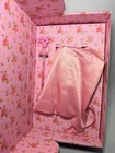 Folding table with pink floral design and white surface