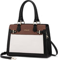 Multicolored handbag with black, brown, and white sections on a white background