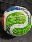Multicolored soccer ball on a dark background