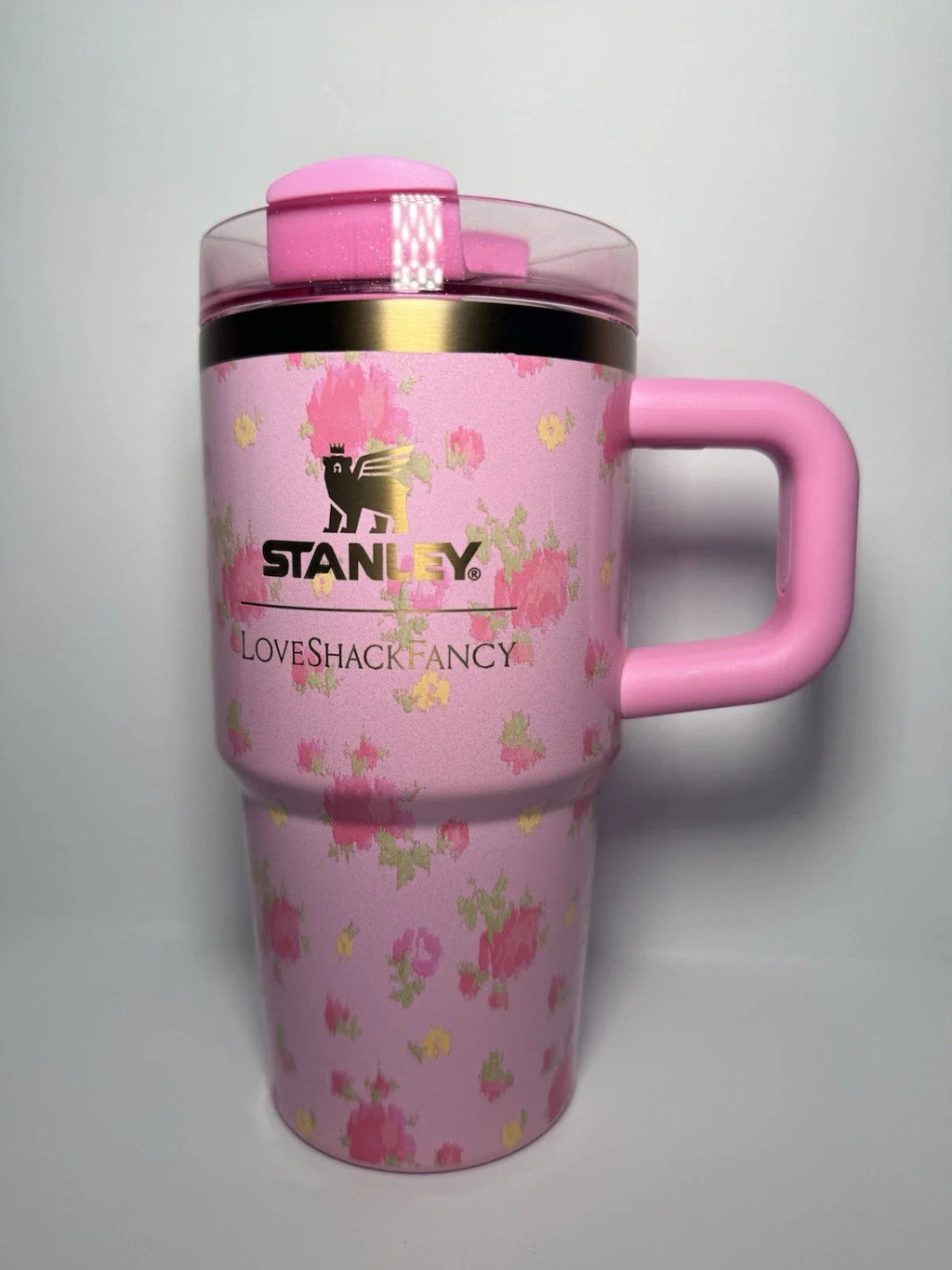 Pink floral Stanley mug on a light gray background