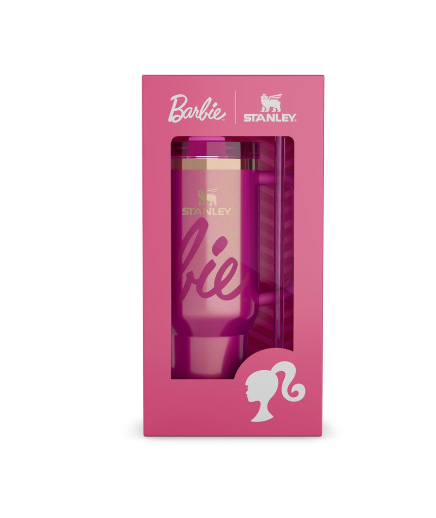 Pink tumbler with 'Barbie' and 'Stanley' branding in a pink box on a white background