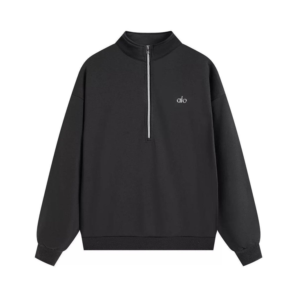 Unisex Alo Yoga Accolade Half-Zip Sweatshirt in soft fabric, featuring a half-zip front and relaxed fit, shown in a neutral color.