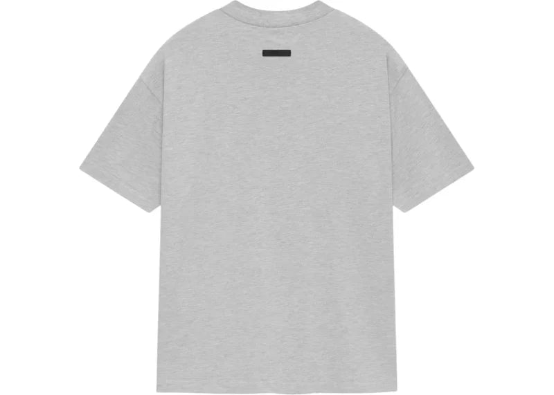 Fear of God Essentials NBA T-shirt in light heather grey, casual men's tee featuring NBA logo and Essentials branding.