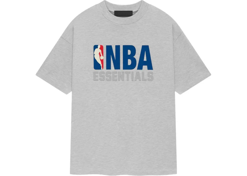 Fear of God Essentials NBA T-shirt in light heather grey with logo design, casual fit, and soft cotton fabric.