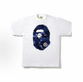 White and blue BAPE ABC Camo Ape Head Tee from THE EA STORE featuring a camo pattern and iconic ape logo design.