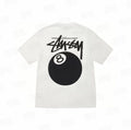 White Stussy 8 Ball Tee from THE EA STORE Essentials collection, featuring a prominent 8 ball graphic on the front.