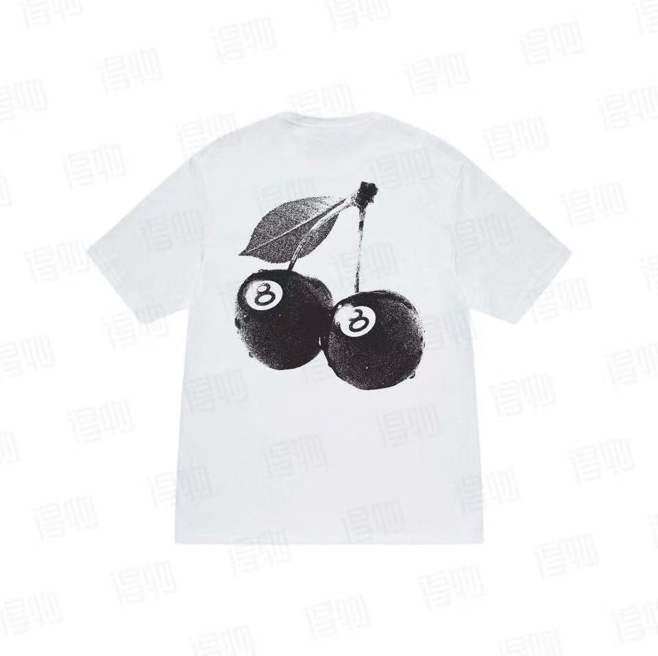 White Stussy Cherry 8 Ball Tee from Essentials collection, featuring a printed cherry and 8 ball graphic on the front.
