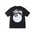 Black Stüssy Classic 8-Ball Graphic Tee from THE EA STORE, featuring bold 8-ball print on soft essentials t-shirt.